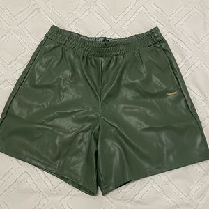 Green leather fabletic shorts